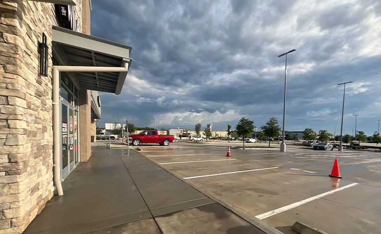 Power Washed Retail Storefront And Parking Lot